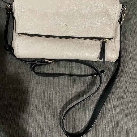 kate spade Handbags - Kate Spade women’s Beige fold-over zip pebbled leather Crossbody Bag